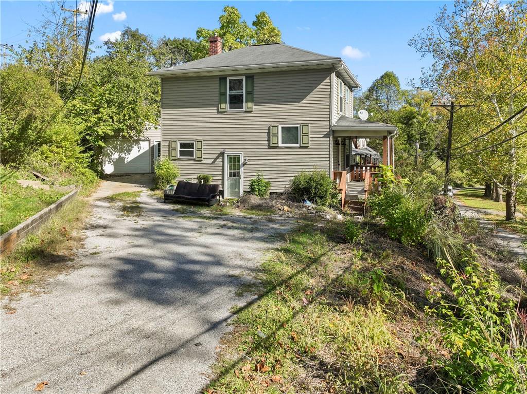 1217 25th Street Beaver Falls, PA 15010 - Photo 3 of 32 a view of a house with a yard