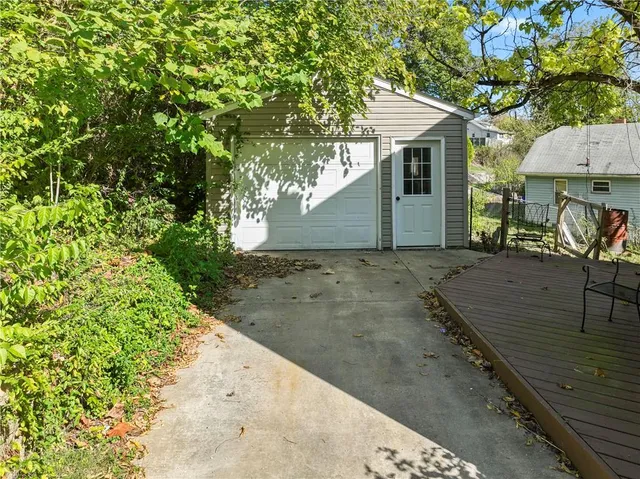 a view of a backyard of the house