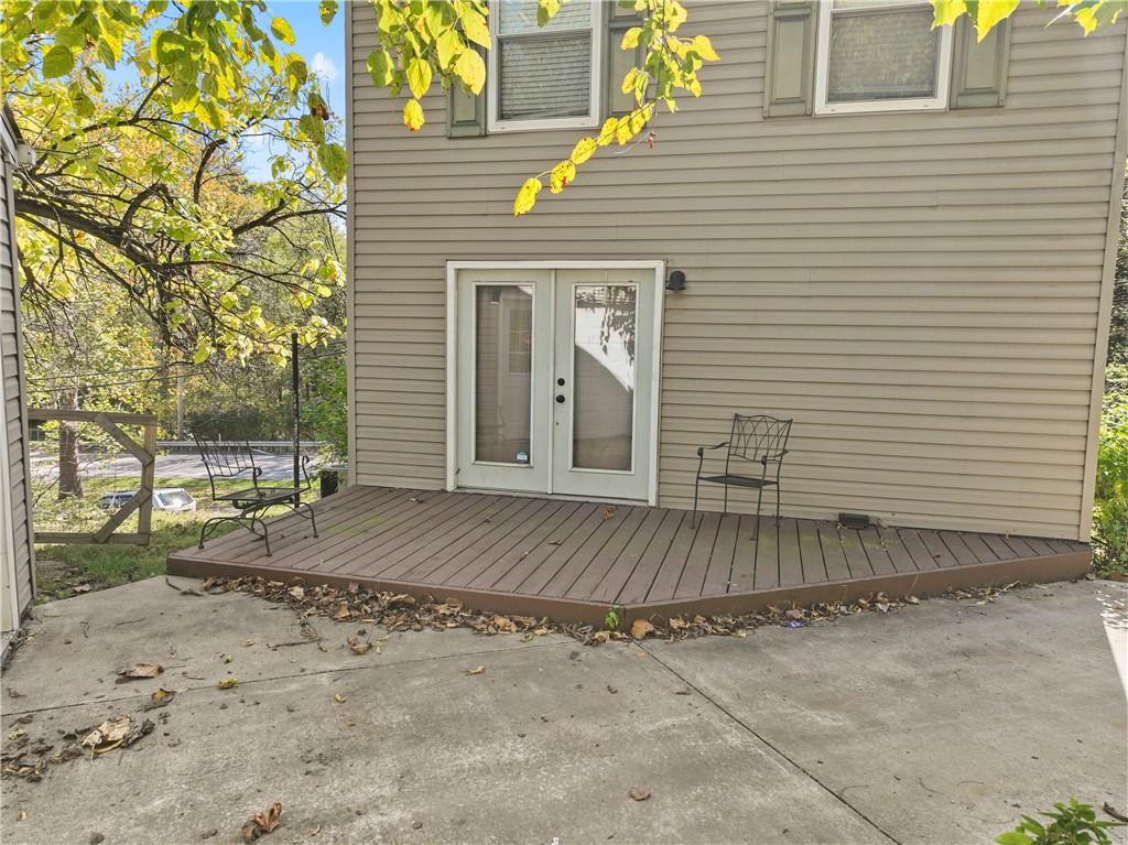 1217 25th Street Beaver Falls, PA 15010 - Photo 7 of 32 a view of a house with a wooden fence