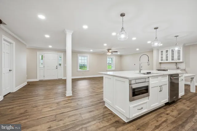 a kitchen with a stove and a sink