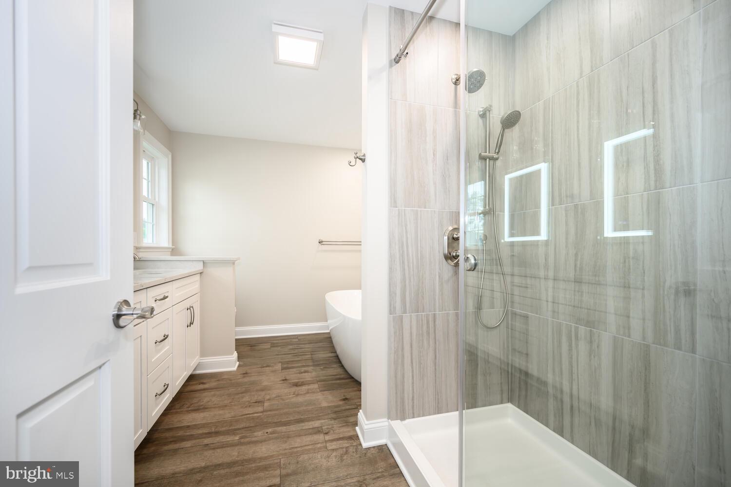 405 Collins Avenue Hurlock, MD 21643 - Photo 16 of 49 a bathroom with a sink a toilet and shower