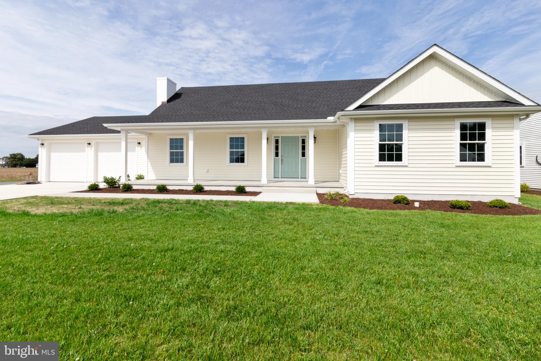 405 Collins Avenue Hurlock, MD 21643 - Photo 41 of 49 a front view of house with yard and green space
