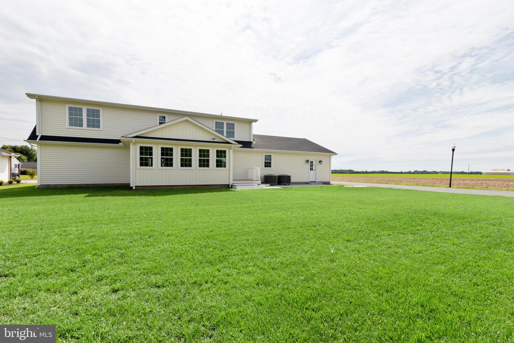 405 Collins Avenue Hurlock, MD 21643 - Photo 43 of 49 a front view of house with yard and green space