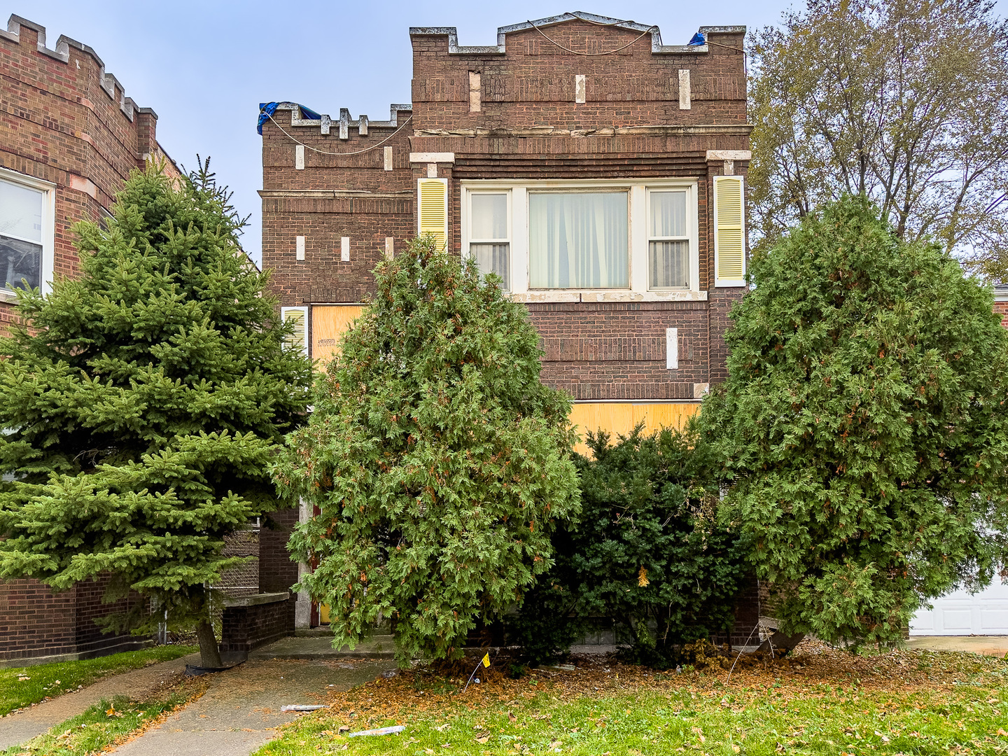 front view of a house with a yard