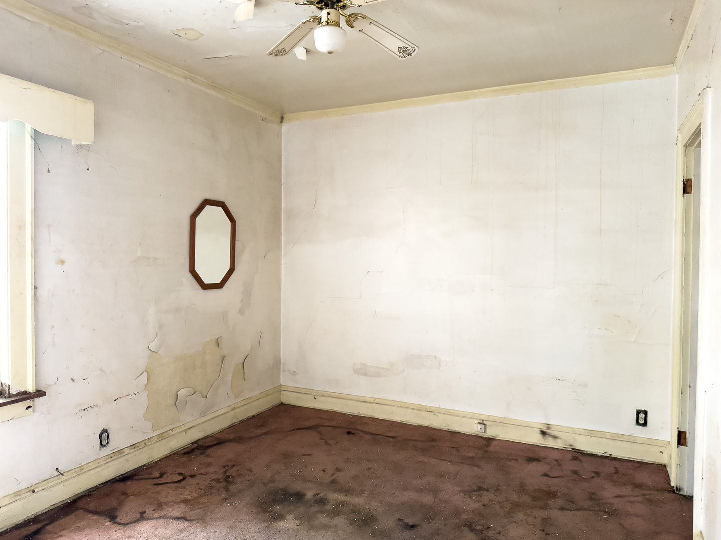 609 East 88th Place Chicago, IL 60619 - Photo 8 of 27 a view of a room with rack on the wall and a shower