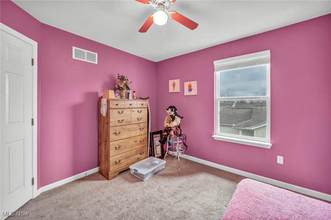 3887 Reeves Lane Medina, OH 44256 - Photo 30 of 42 Carpeted bedroom with ceiling fan