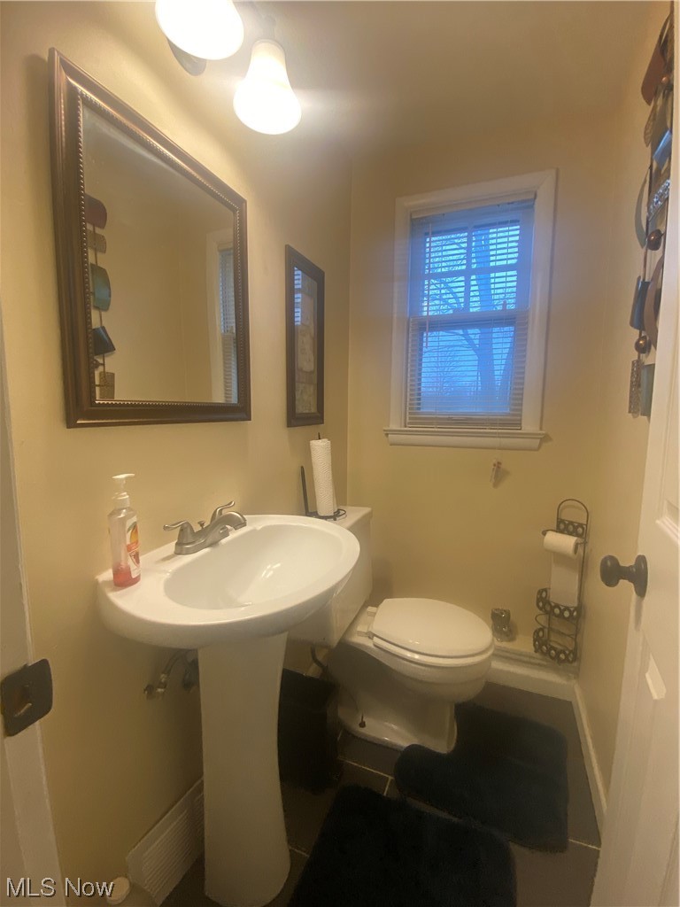 1500 Edgefield Road Lyndhurst, OH 44124 - Photo 11 of 24 Half Bathroom featuring toilet and sink