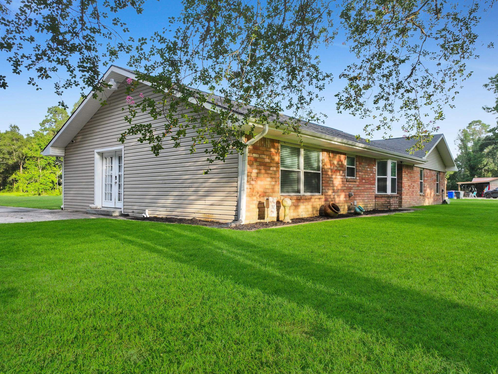 2641 Oilla Road Orange, TX 77630 - Photo 2 of 50 a view of a house with backyard