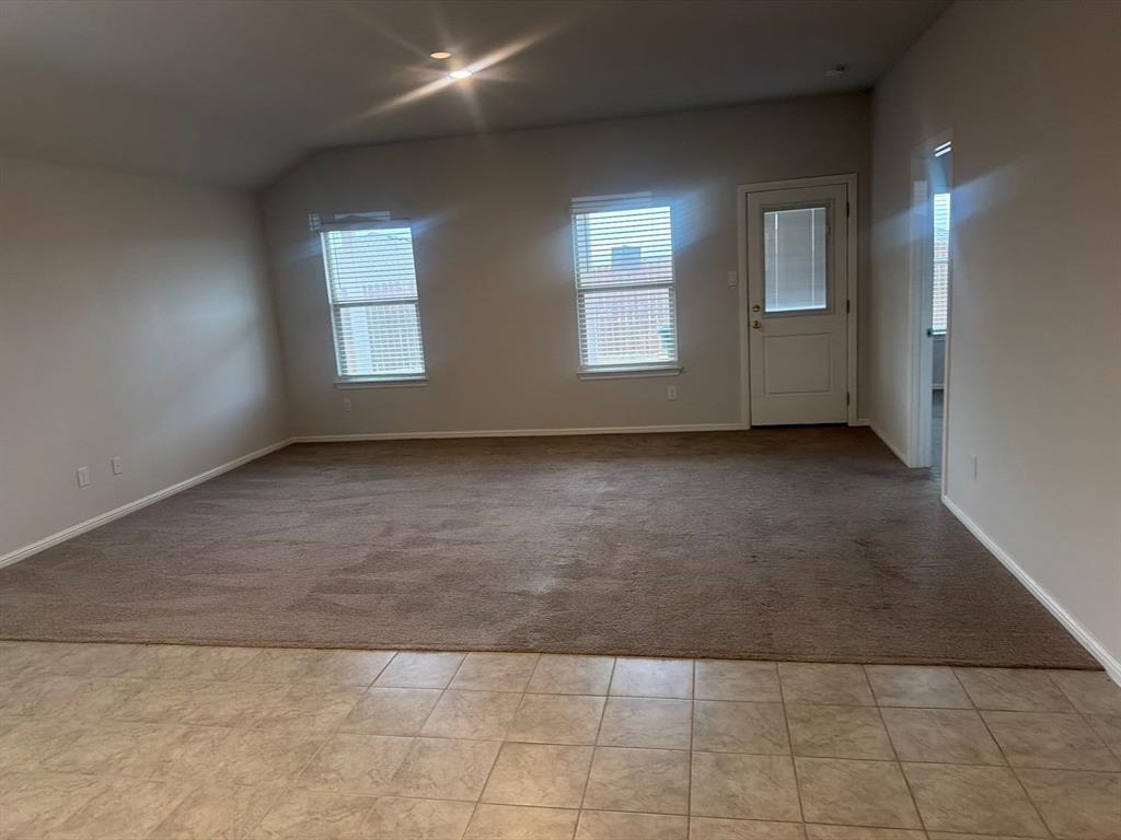 721 Durango Lane Cleburne, TX 76033 - Photo 3 of 25 an empty room with windows