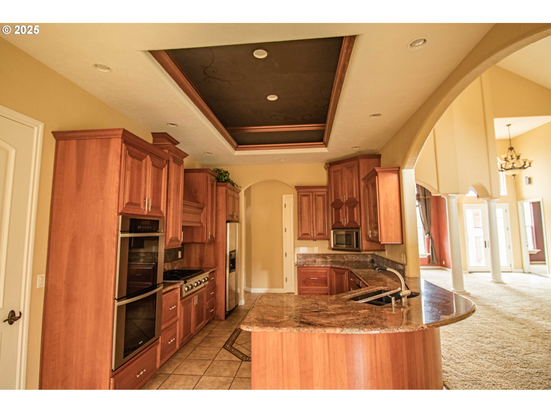 3760 Meadow View Drive Eugene, OR 97408 - Photo 18 of 46 a kitchen with stainless steel appliances granite countertop a refrigerator and a sink
