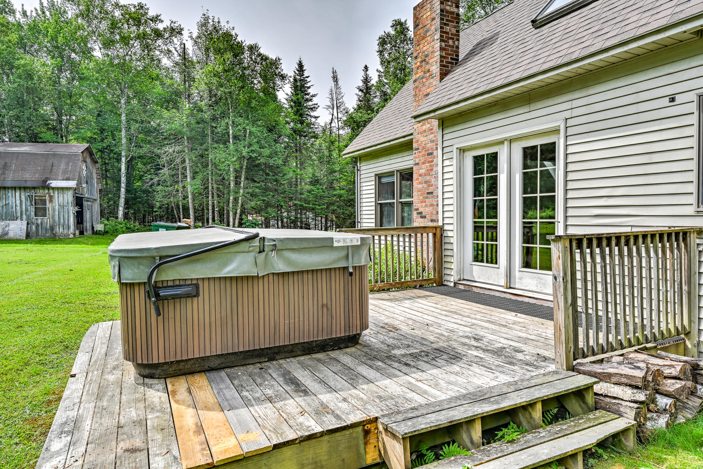 261 Quimby Pond Road Rangeley, ME 04970 - Photo 36 of 47 hot tub and deck