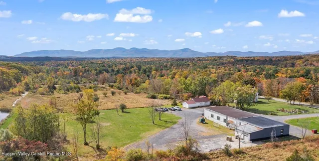 a view of a swimming pool and lake view