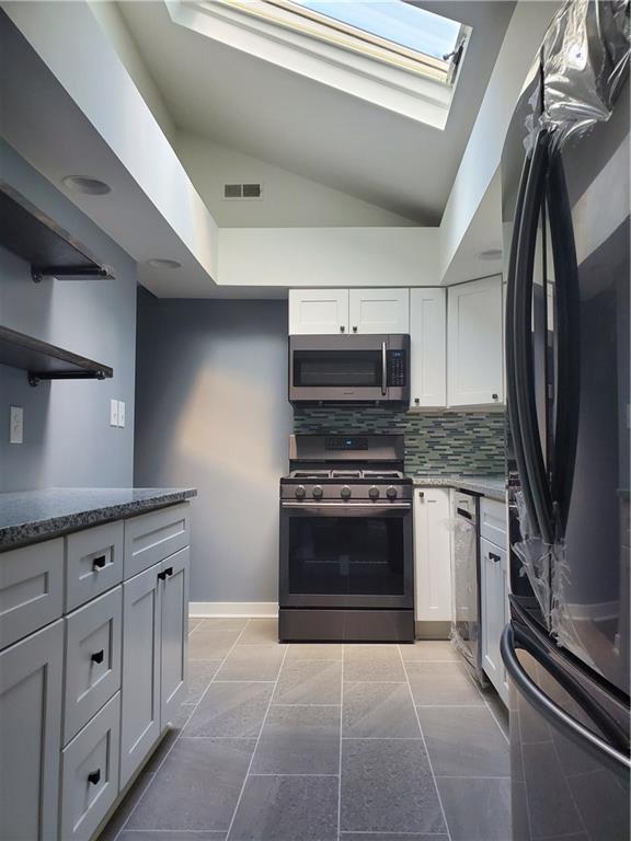 227 West Bruceton Road Pittsburgh, PA 15236 - Photo 6 of 23 Kitchen w/ Skylight