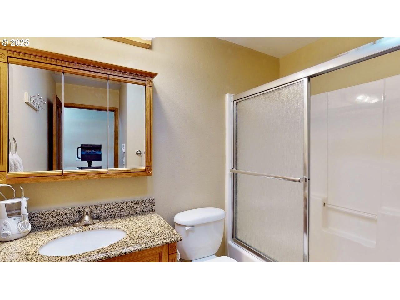 869 North Collier Street Coquille, OR 97423 - Photo 21 of 41 a bathroom with a sink and a toilet