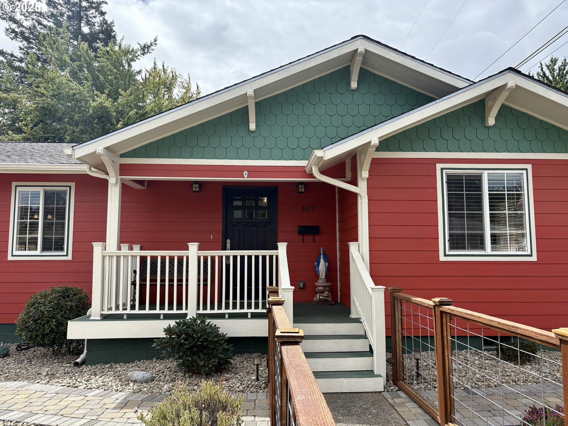 869 North Collier Street Coquille, OR 97423 - Photo 4 of 41 a view of a house with a yard and deck