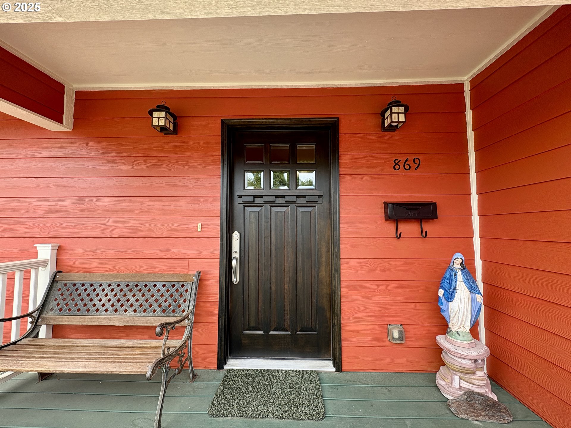 869 North Collier Street Coquille, OR 97423 - Photo 5 of 41 a view of a wooden door and outdoor space