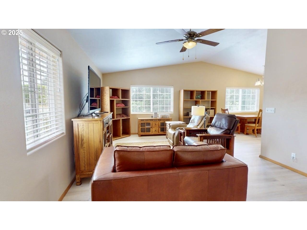 869 North Collier Street Coquille, OR 97423 - Photo 9 of 41 a living room with furniture window and a ceiling fan