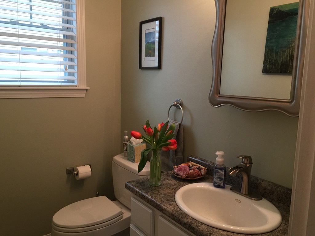 157 Oman Street Fall River, MA 02721 - Photo 15 of 19 a bathroom with a toilet sink and mirror