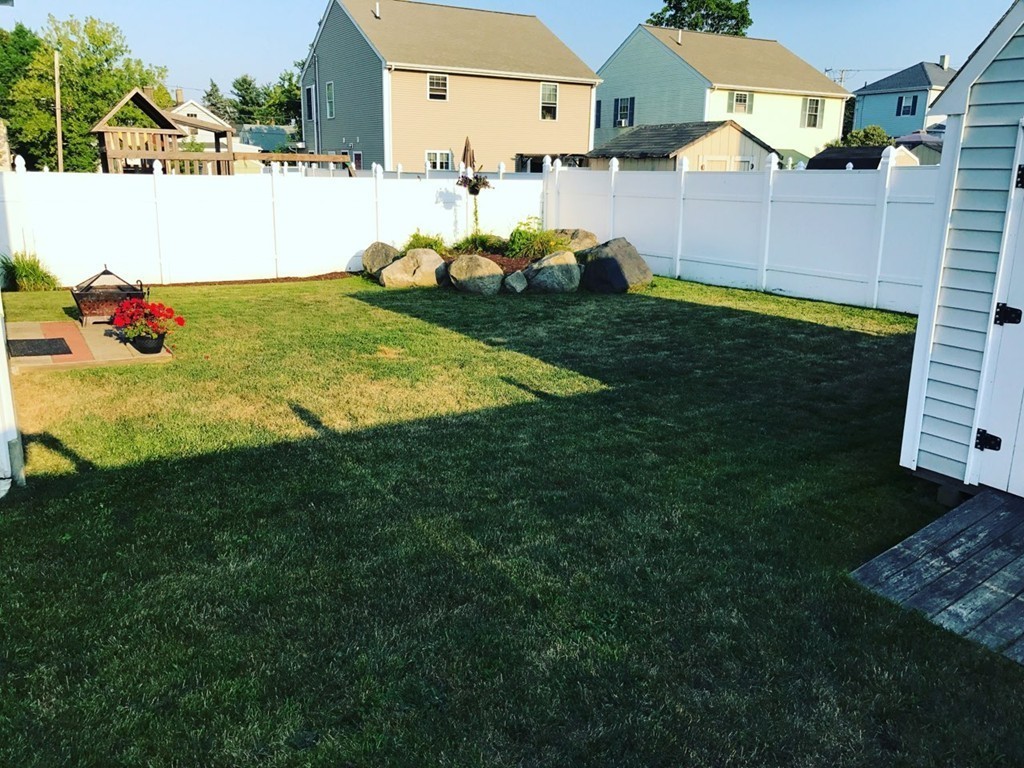 157 Oman Street Fall River, MA 02721 - Photo 18 of 19 a view of an outdoor space and yard