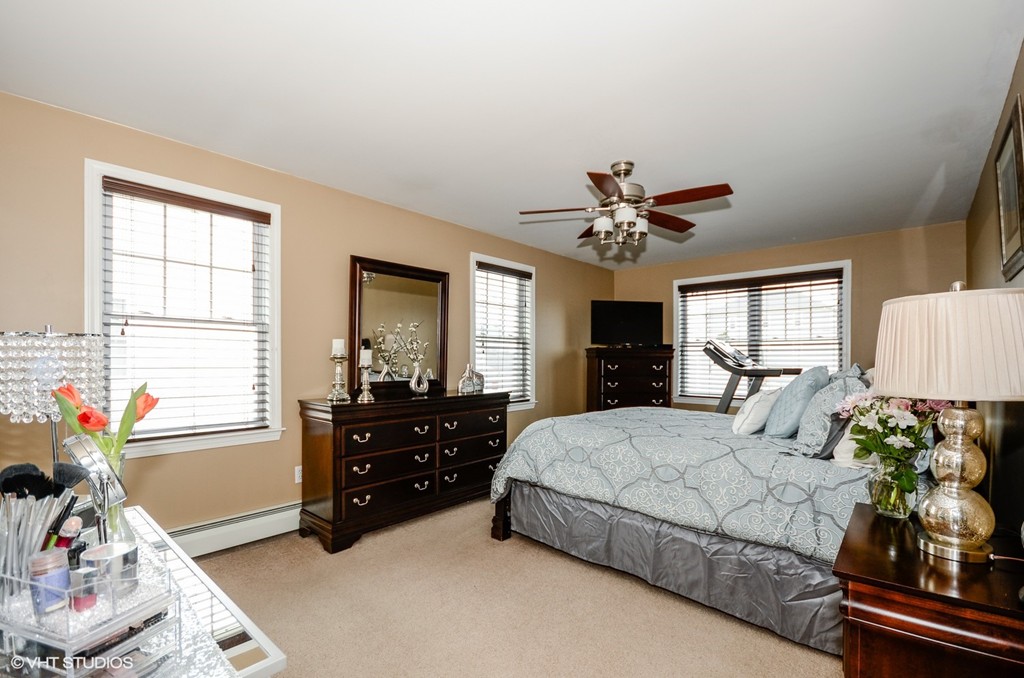 157 Oman Street Fall River, MA 02721 - Photo 10 of 19 a bedroom with a bed and a window