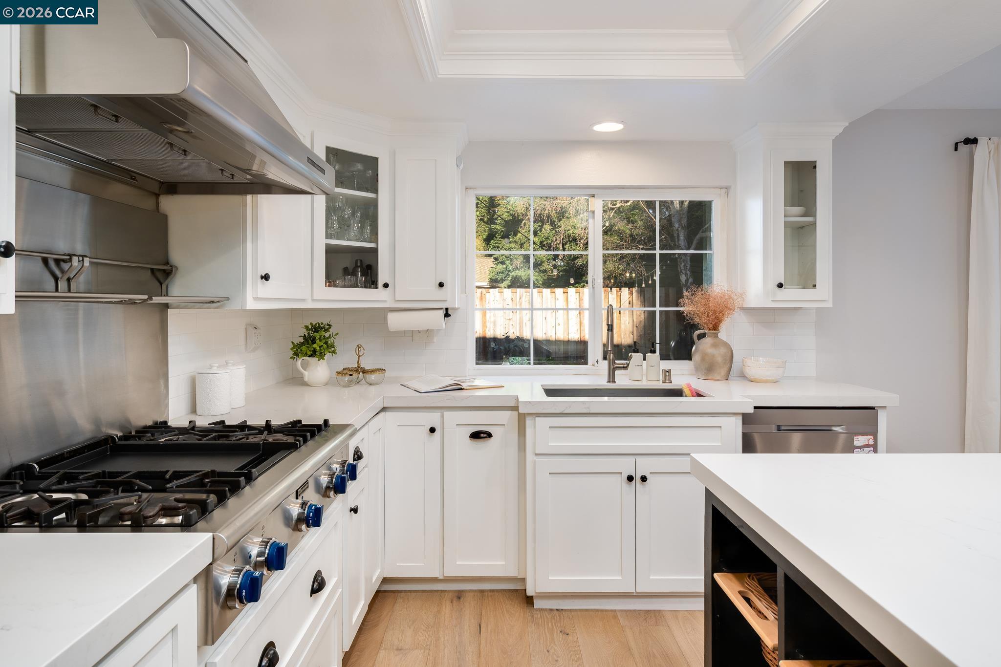 34 Pony Court San Ramon, CA 94583 - Photo 11 of 34 a kitchen with stainless steel appliances sink and wooden cabinets