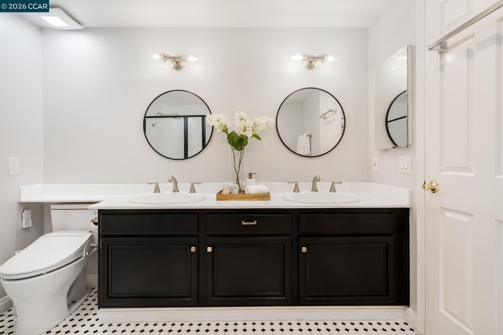 34 Pony Court San Ramon, CA 94583 - Photo 18 of 34 a bathroom with a sink and a mirror