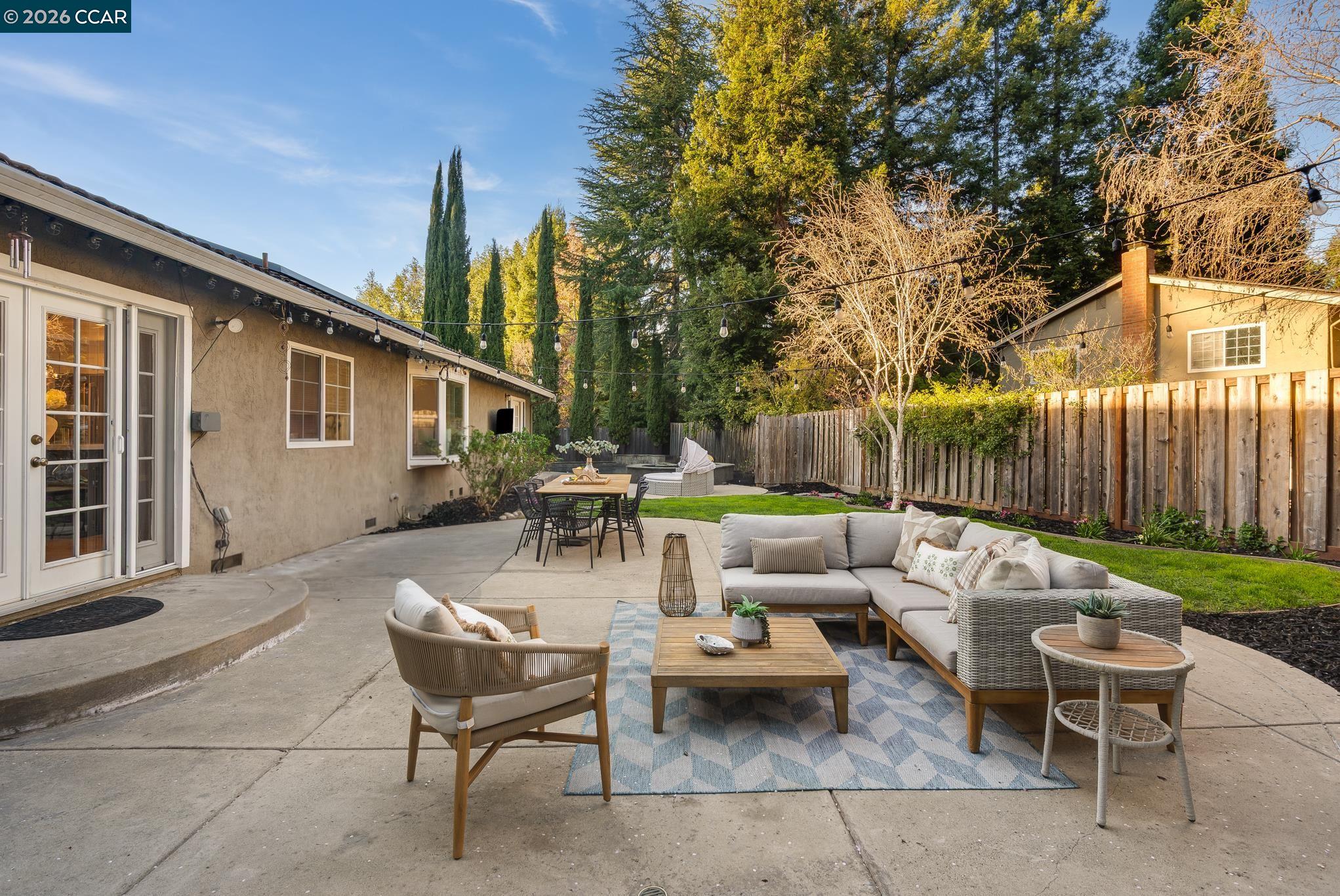 34 Pony Court San Ramon, CA 94583 - Photo 23 of 34 a backyard of a house with table and chairs