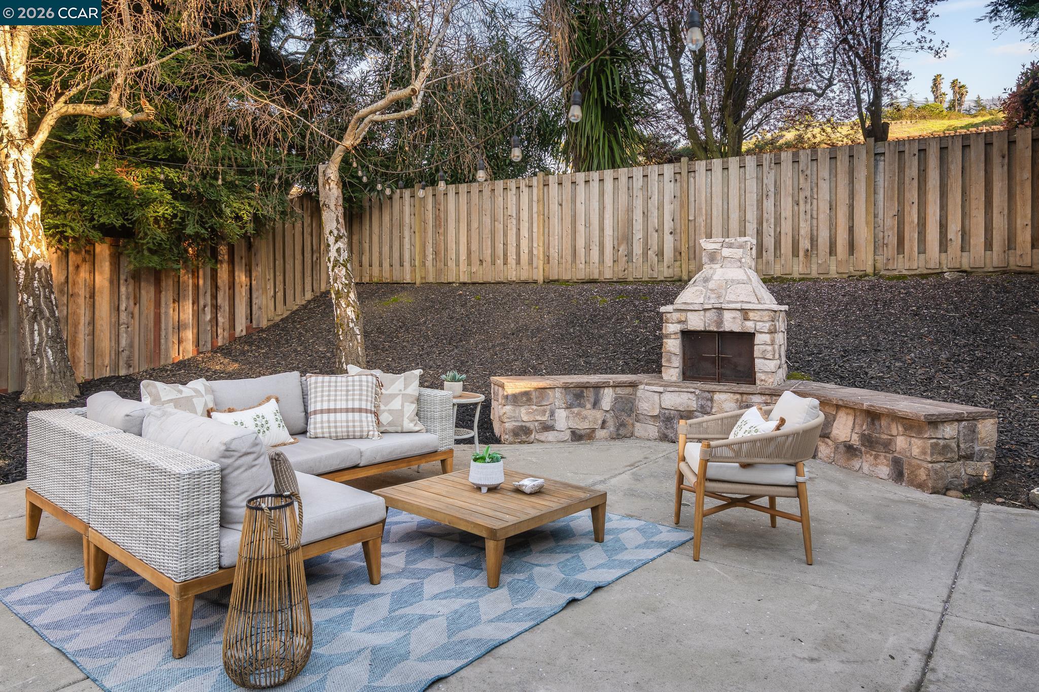 34 Pony Court San Ramon, CA 94583 - Photo 27 of 34 a view of a chairs and table in the back yard of the house