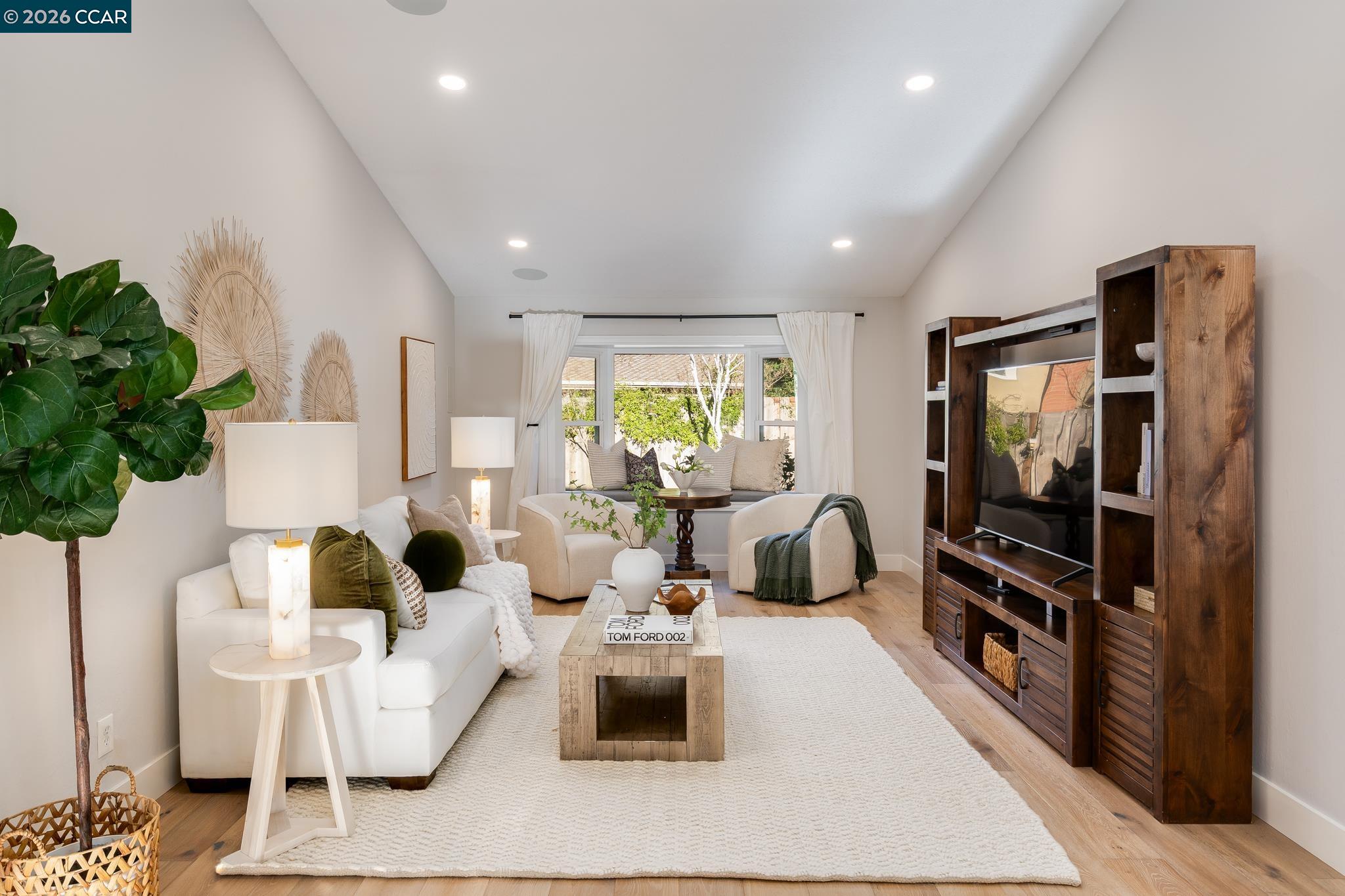 34 Pony Court San Ramon, CA 94583 - Photo 3 of 34 a room with furniture a flat screen tv and a large window