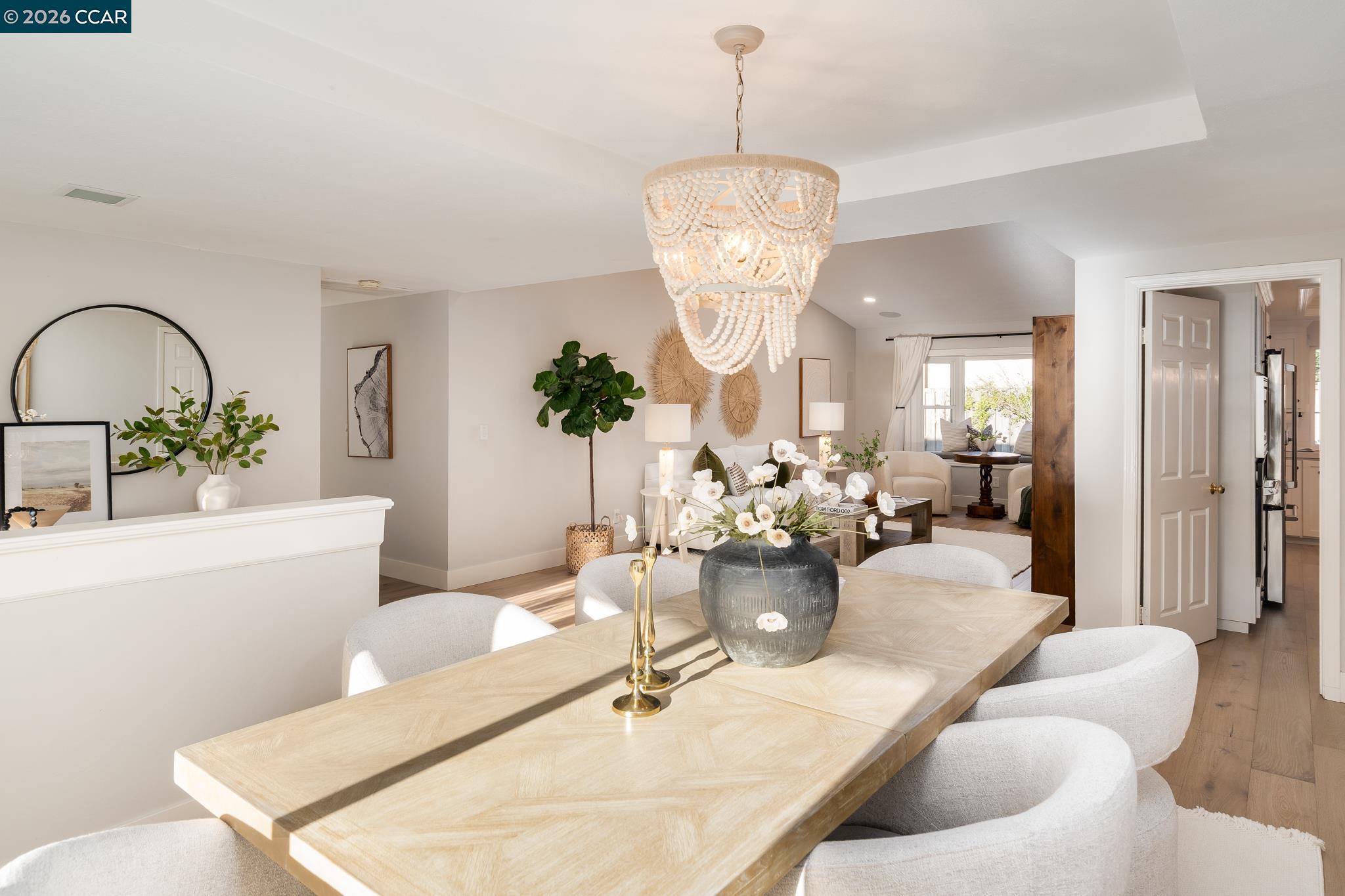 34 Pony Court San Ramon, CA 94583 - Photo 7 of 34 a living room with furniture and a chandelier