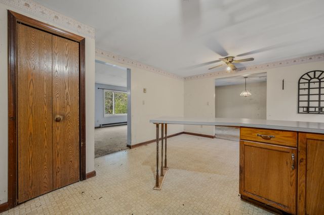 a view of a livingroom with a staircase