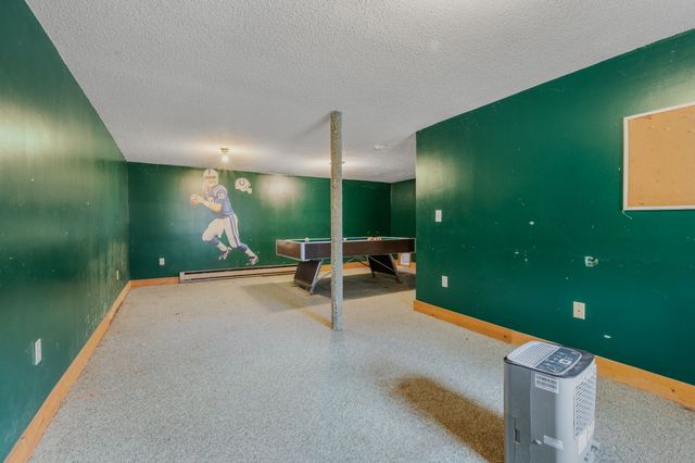 a gaming hall with table and chairs