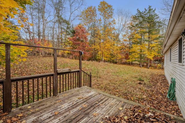 a view of wooden floor with a dry yard