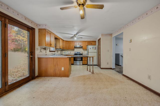 a view of a kitchen with a sink