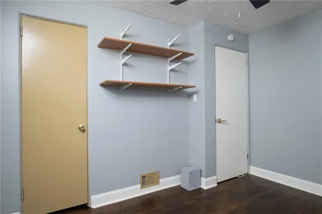 a view of small space with wooden floor