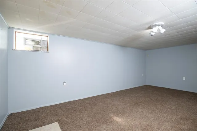 a bathroom with a sink vanity and a mirror