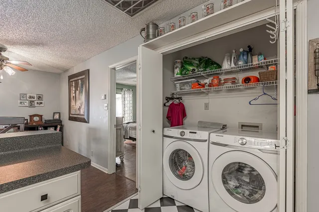 a utility room with dryer and washer
