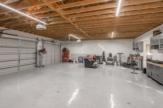 a view of a garage with storage