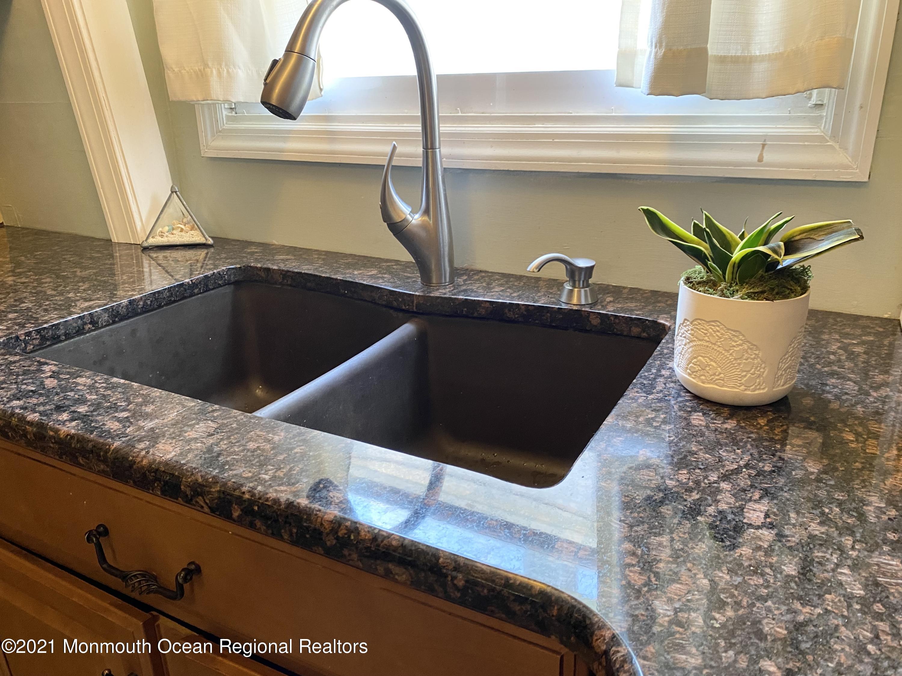 103 George Road Toms River, NJ 08753 - Photo 14 of 34 a close view of sink and tap
