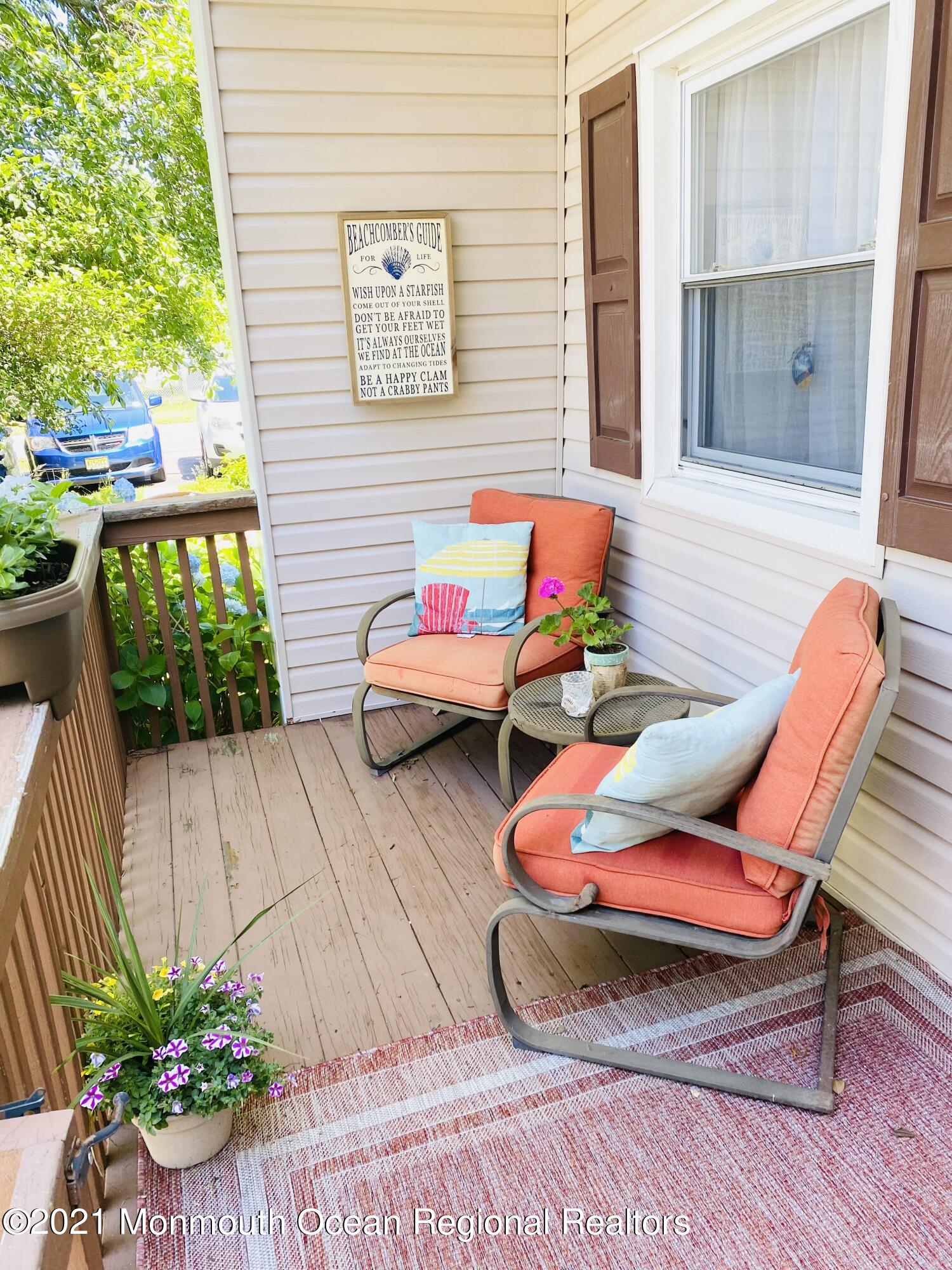 103 George Road Toms River, NJ 08753 - Photo 3 of 34 a building outdoor space with patio furniture
