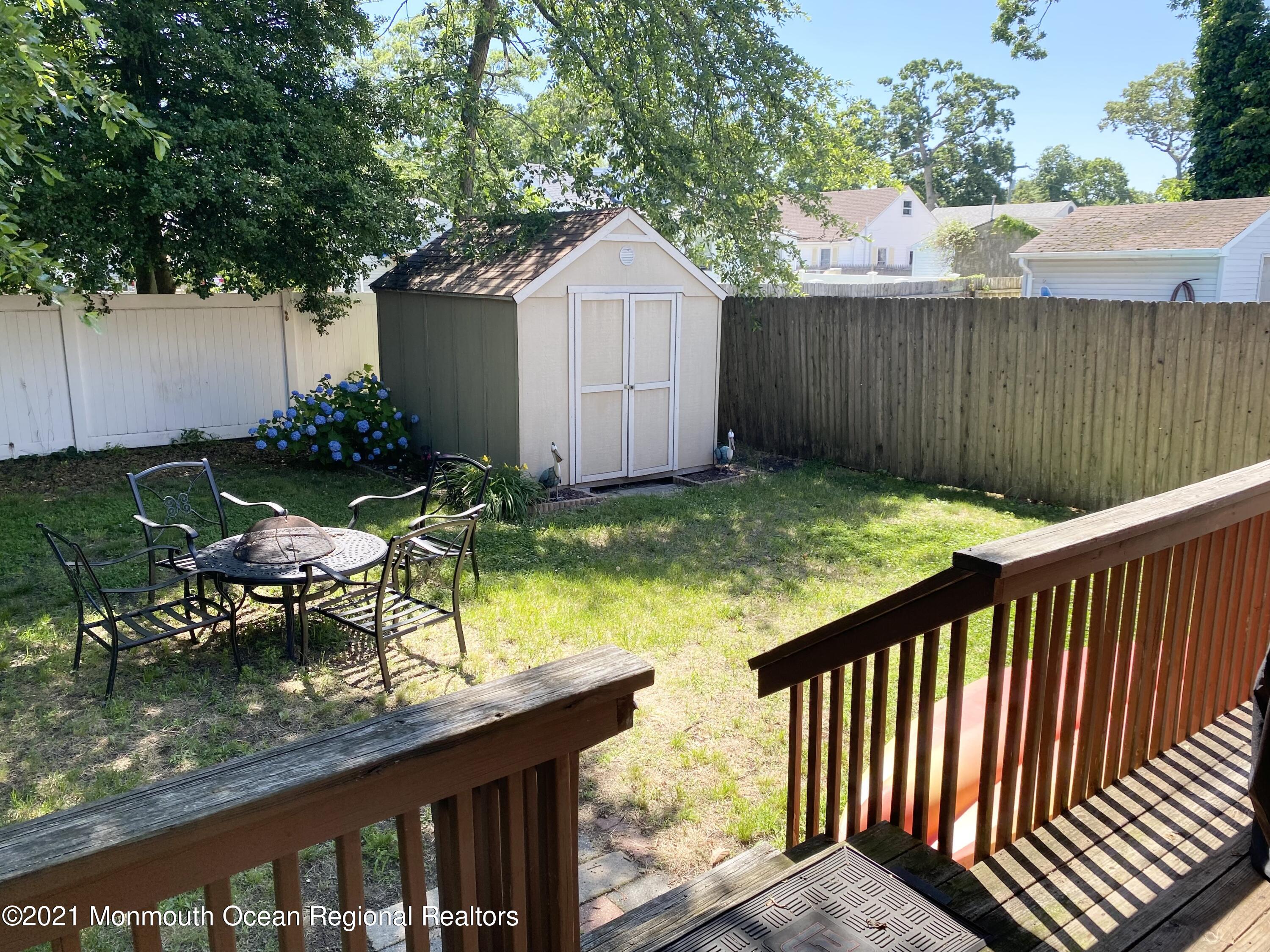 103 George Road Toms River, NJ 08753 - Photo 29 of 34 a view of house with backyard and furniture