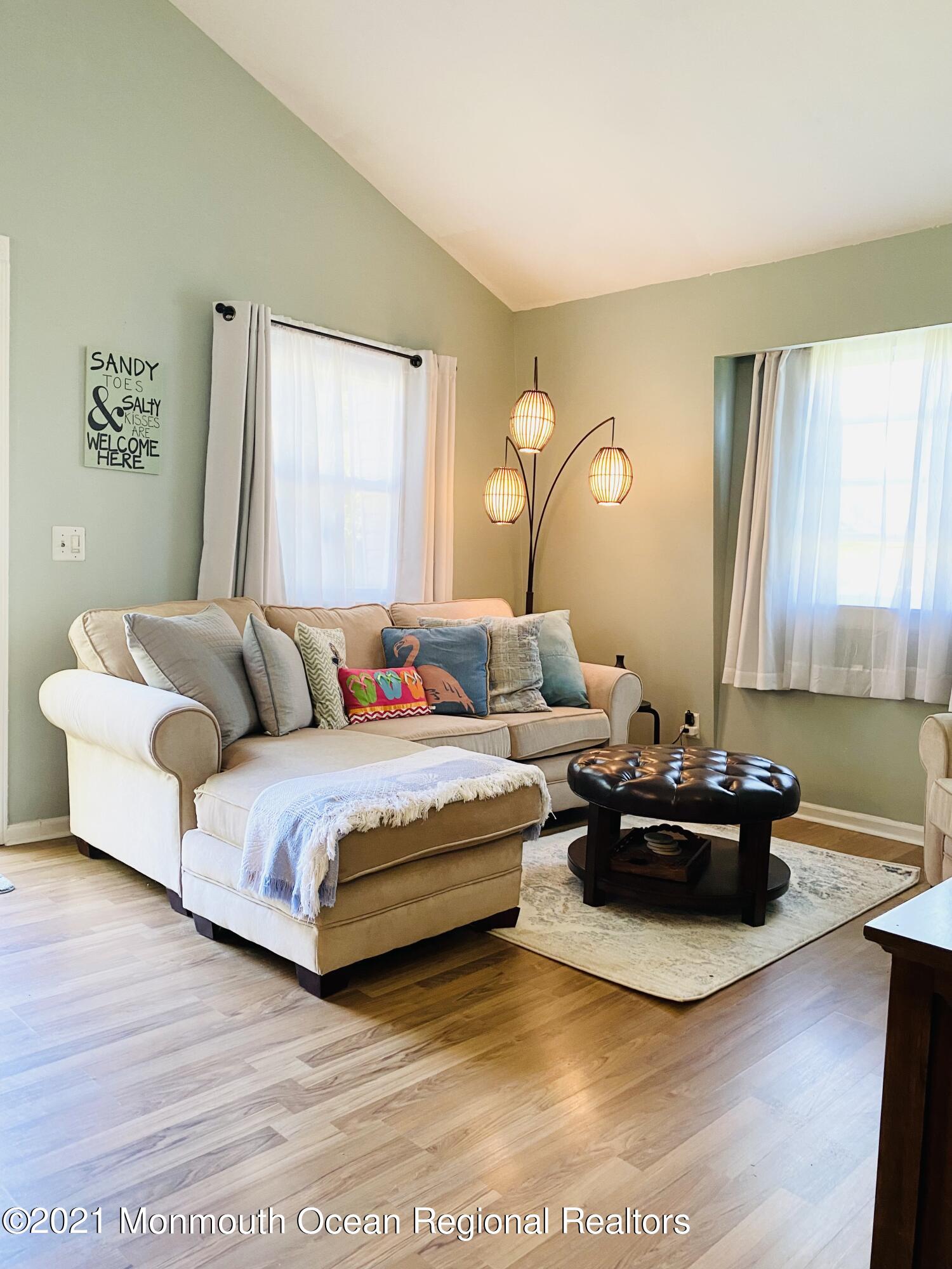 103 George Road Toms River, NJ 08753 - Photo 7 of 34 a living room with furniture and a large window