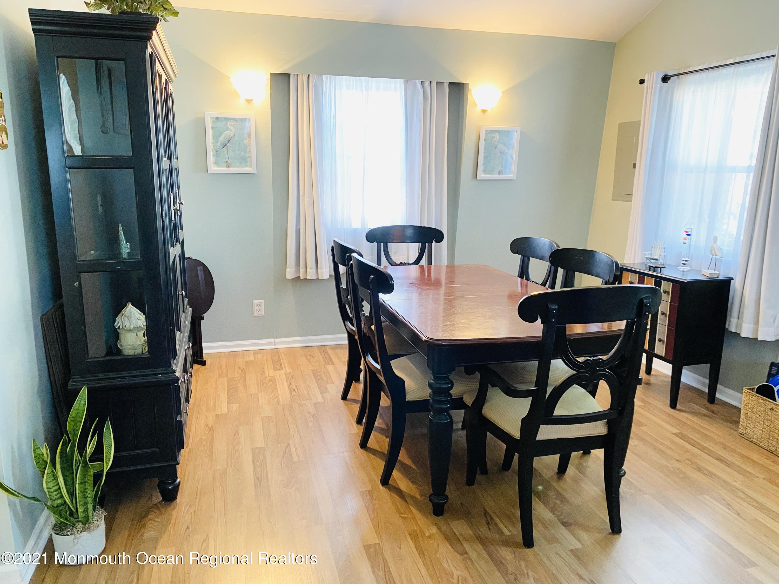 103 George Road Toms River, NJ 08753 - Photo 8 of 34 a view of a dining room with furniture and wooden floor