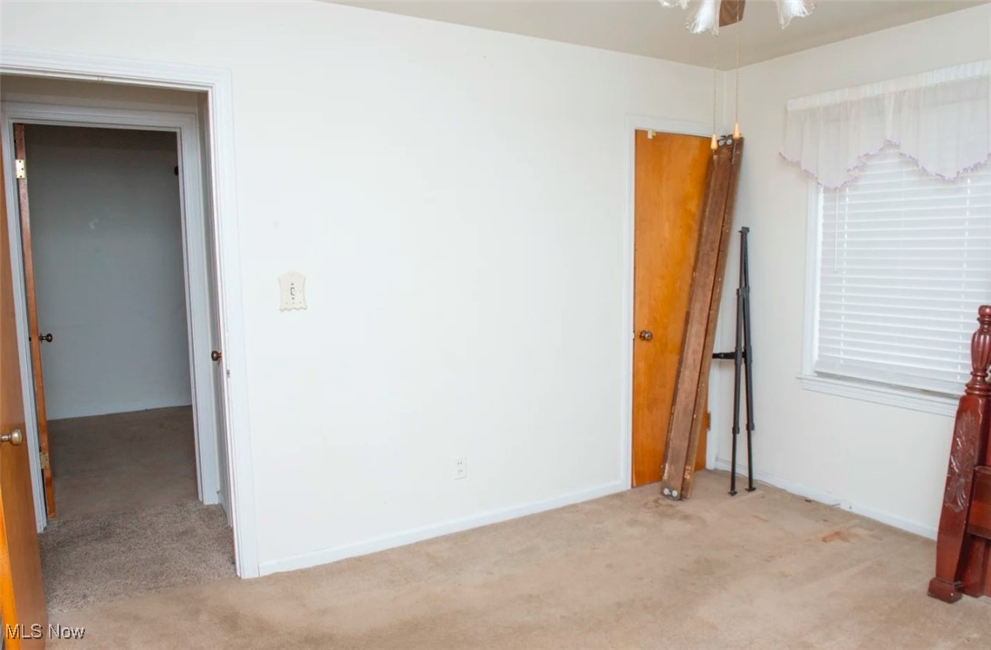 3123 South Meridian Road Youngstown, OH 44511 - Photo 11 of 20 Spare room featuring light colored carpet