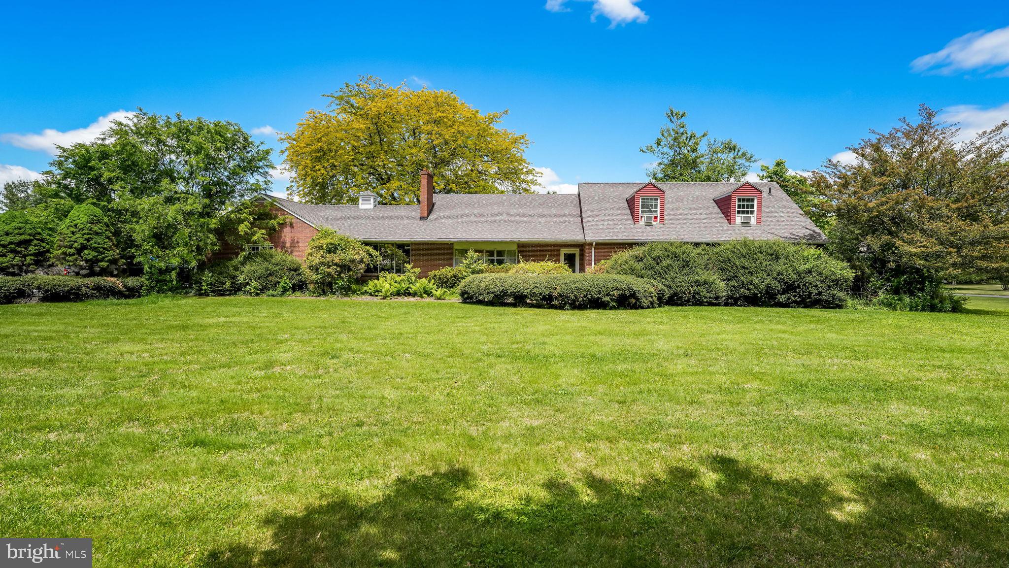 1591 Middletown Road Glen Mills, PA 19342 - Photo 1 of 55 a front view of house with yard and green space