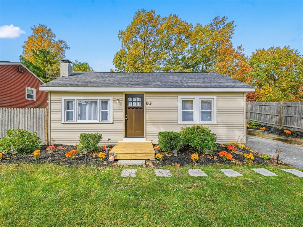 a house view with a garden space