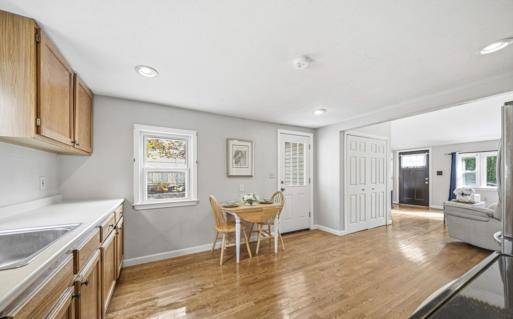 63 Juniper Road Holbrook, MA 02343 - Photo 13 of 35 a living room with furniture and a wooden floor