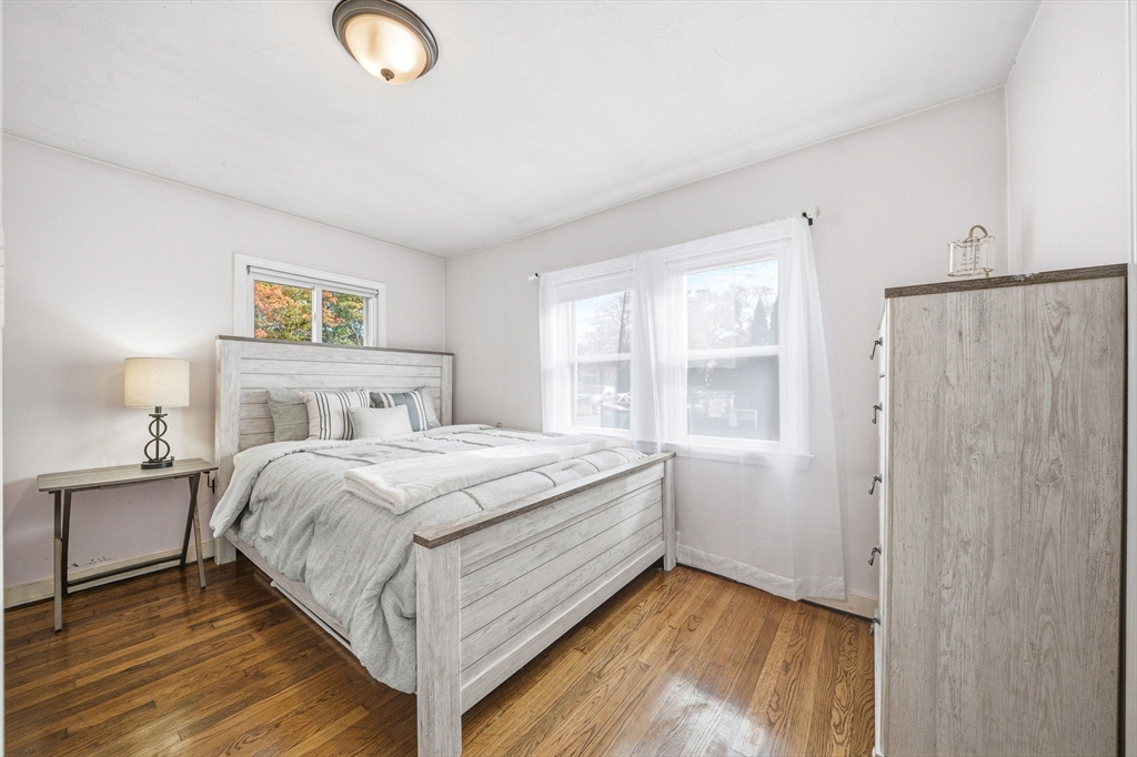 63 Juniper Road Holbrook, MA 02343 - Photo 20 of 35 a bedroom with a bed and a window