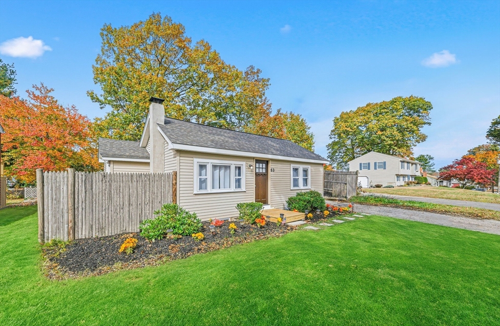 63 Juniper Road Holbrook, MA 02343 - Photo 2 of 35 a house view with a garden space