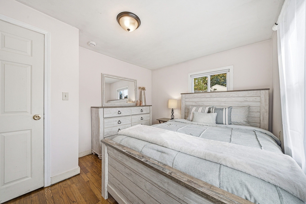 63 Juniper Road Holbrook, MA 02343 - Photo 22 of 35 a bedroom with a bed and a dresser